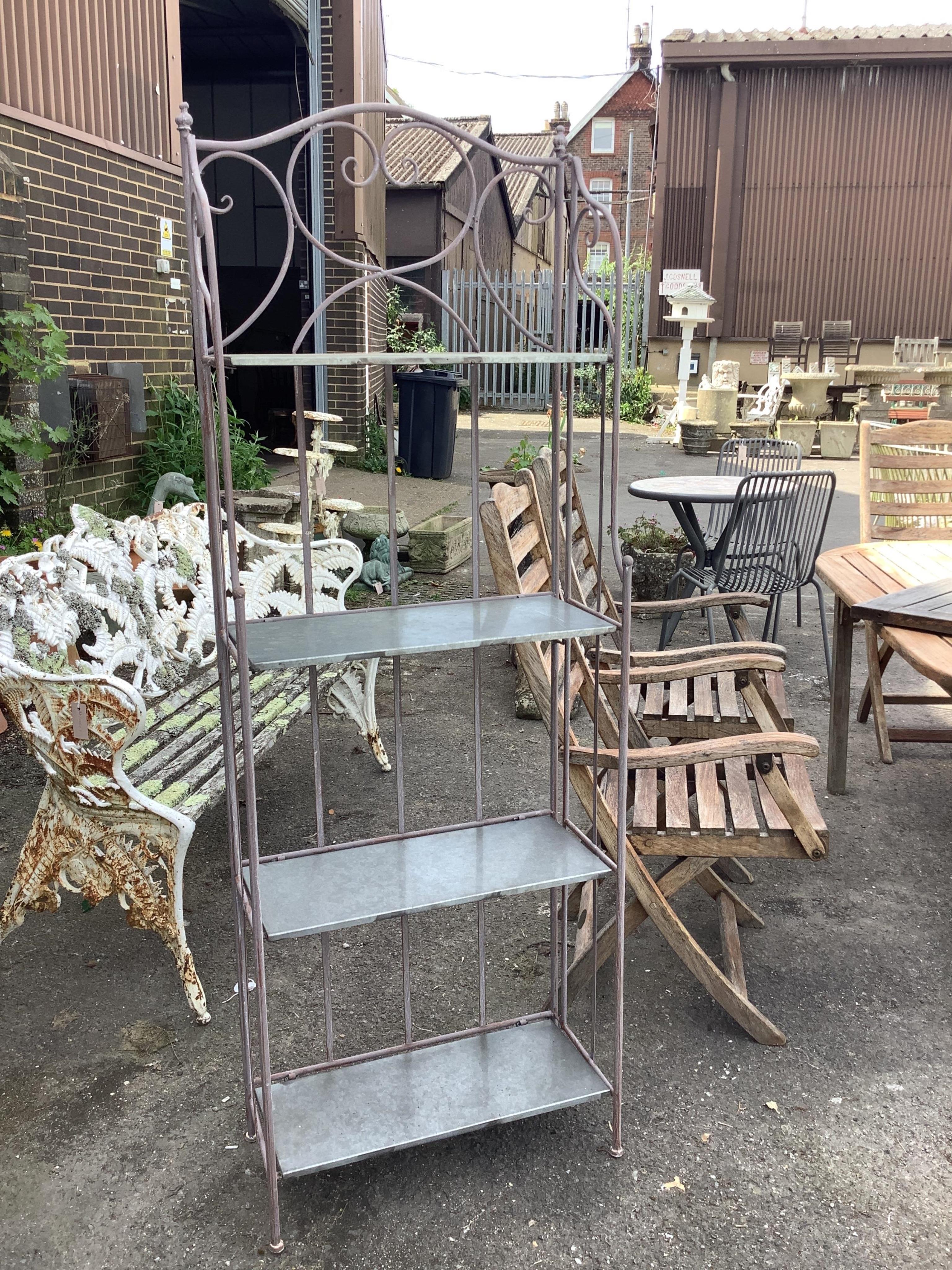 A pair of metal and zinc four tier folding stands, width 58cm, depth 28cm, height 164cm